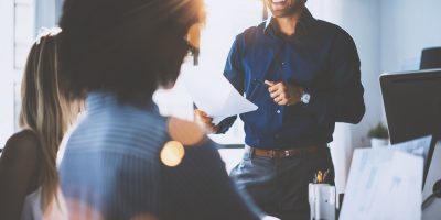 Co-working Team with Man Leading the meeting